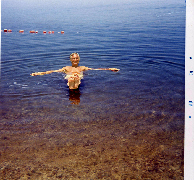 Dad floating in the Dead Sea
